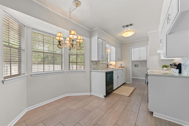 8302 Merriwood Ct, Sherwood, AR 72120 - kitchen featuring white cabinets, tasteful backsplash, visible vents, and light countertops