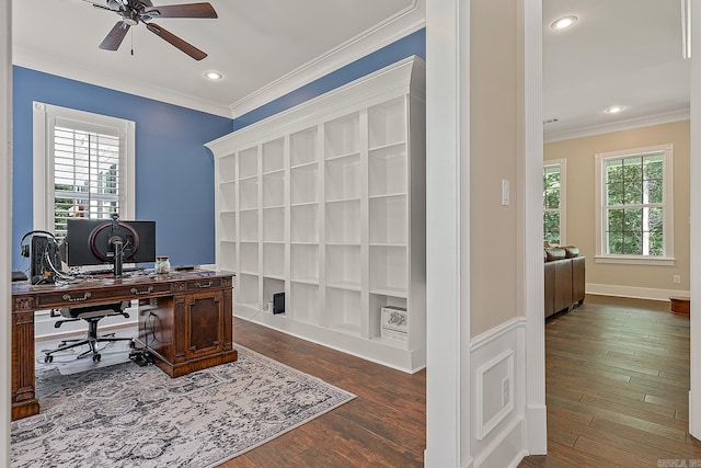 office with recessed lighting, dark wood finished floors, a ceiling fan, ornamental molding, and built in features