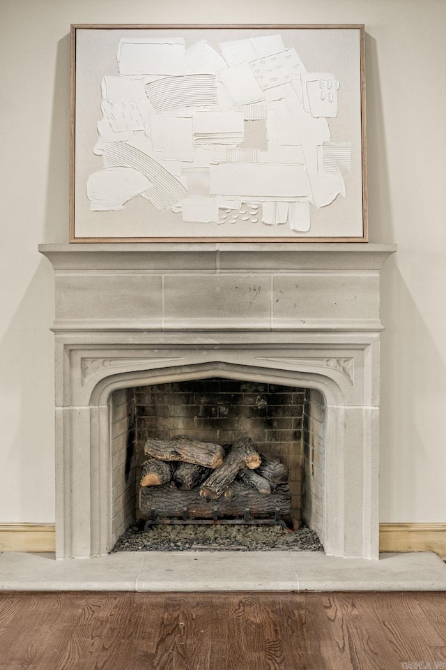 room details featuring a large fireplace