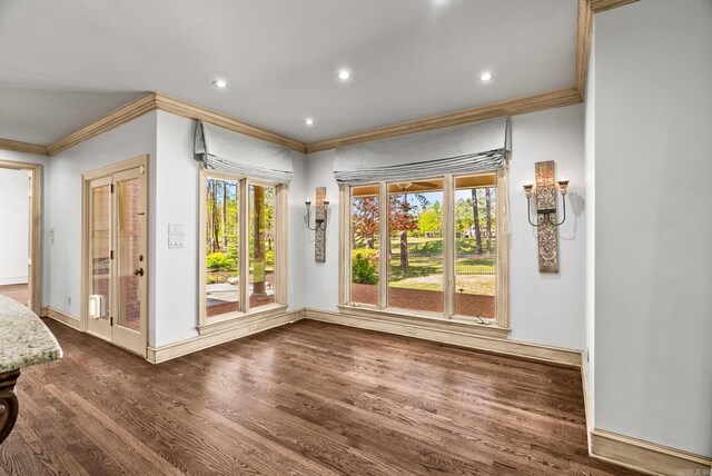 doorway to outside featuring recessed lighting, dark wood-style flooring, ornamental molding, and baseboards