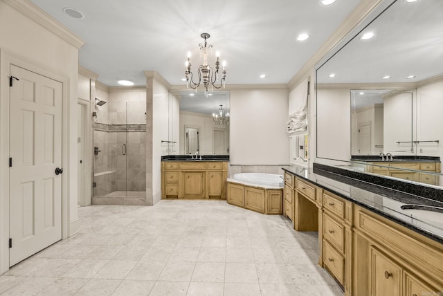 bathroom with a stall shower, recessed lighting, a notable chandelier, a garden tub, and ornamental molding