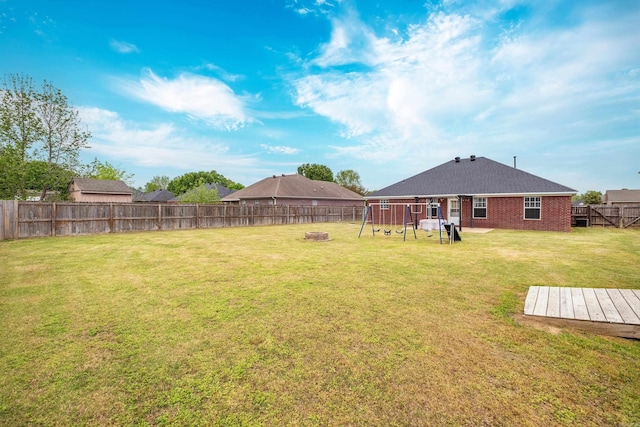 view of yard featuring a fenced backyard