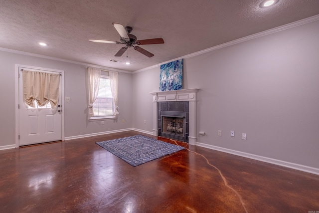 living room with a textured ceiling, recessed lighting, a ceiling fan, crown molding, and a fireplace