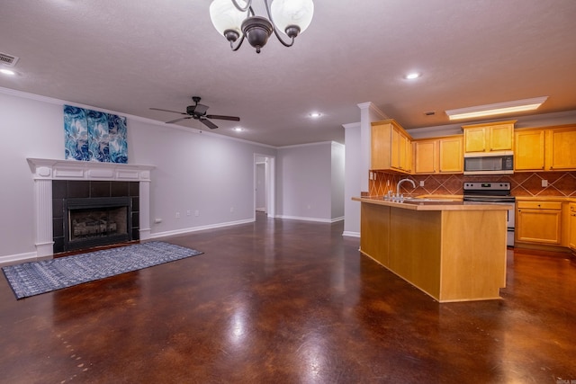 kitchen with electric range, decorative backsplash, open floor plan, and finished concrete floors