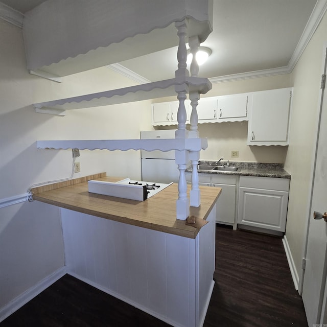 200 N Fillmore St, Little Rock, AR 72205 - kitchen featuring white cabinets, a sink, and dark wood-type flooring