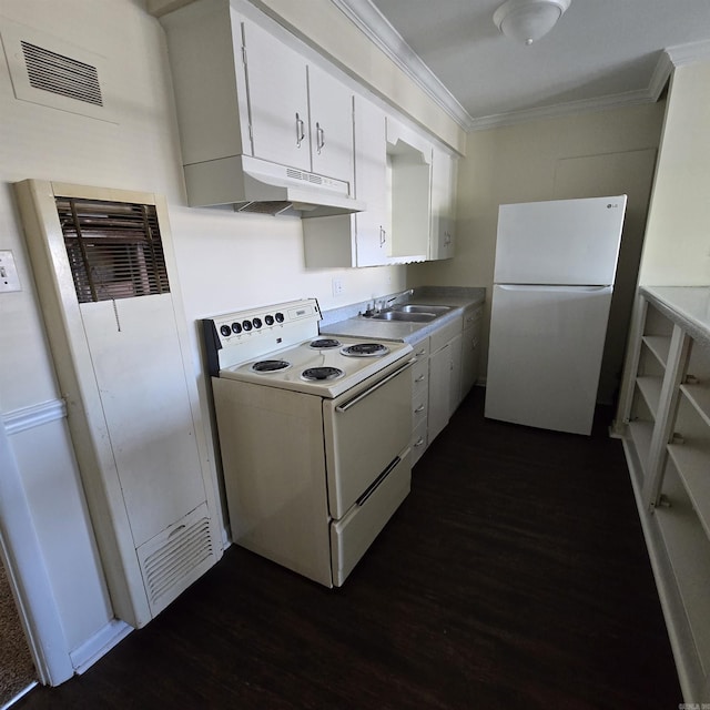 200 N Fillmore St, Little Rock, AR 72205 - kitchen with a sink, white appliances, under cabinet range hood, a heating unit, and dark wood-type flooring