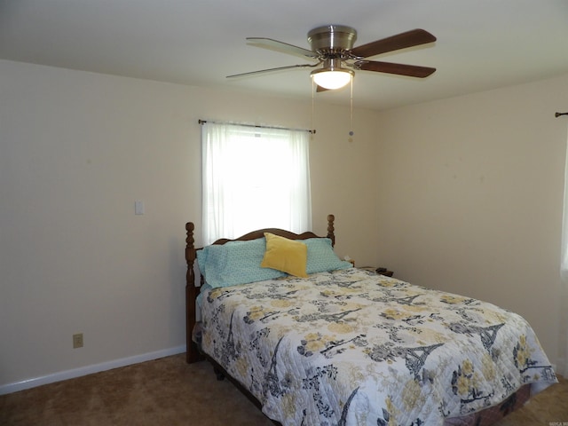 bedroom with baseboards, carpet flooring, and ceiling fan