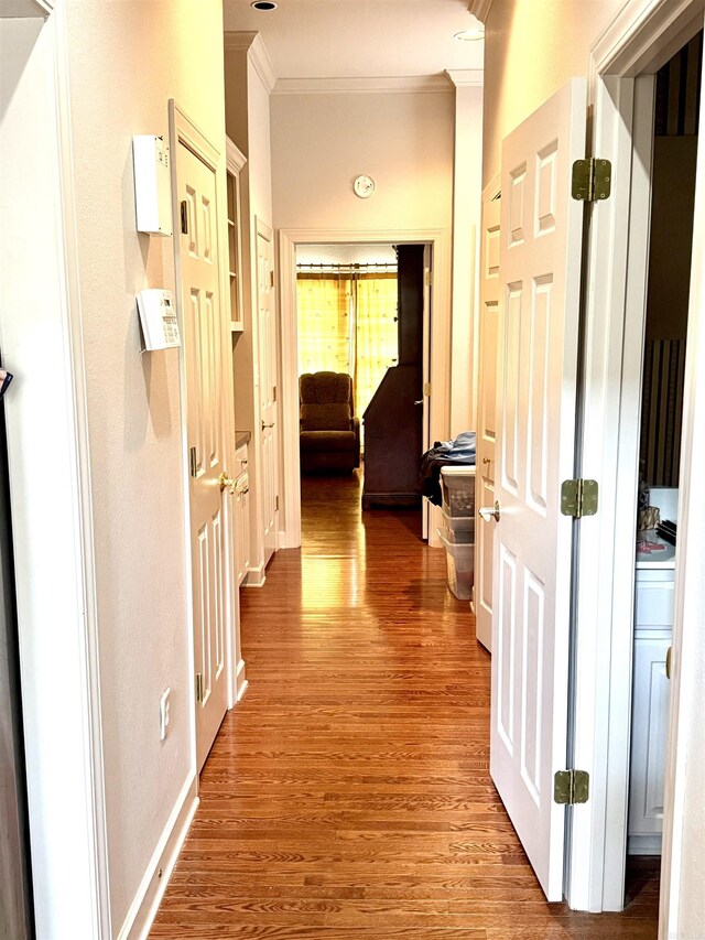2308 Saxony Blvd, Searcy, AR 72143 - hallway featuring ornamental molding and wood finished floors