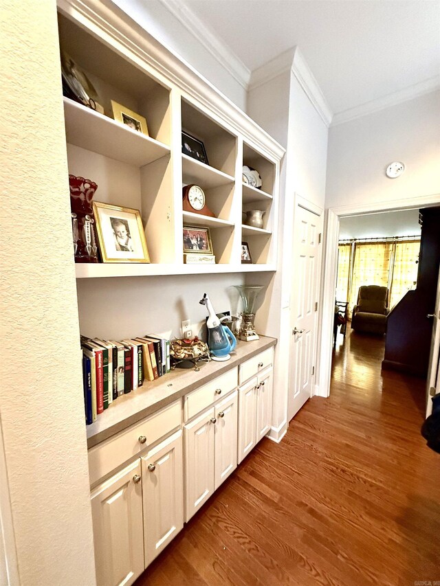 2308 Saxony Blvd, Searcy, AR 72143 - hall with dark wood finished floors and crown molding