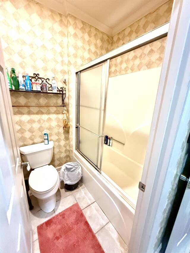 2308 Saxony Blvd, Searcy, AR 72143 - full bath with toilet, ornamental molding, tile patterned flooring, and shower / bath combination with glass door