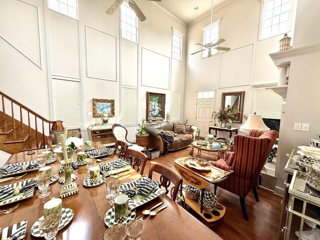 2308 Saxony Blvd, Searcy, AR 72143 - living area with plenty of natural light, wood finished floors, a high ceiling, and ceiling fan