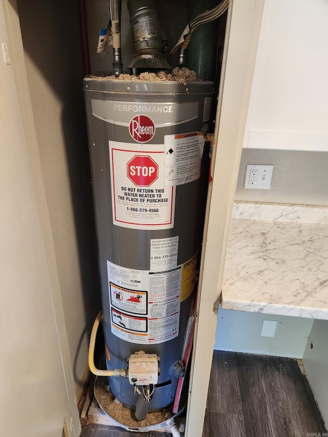 utility room with water heater