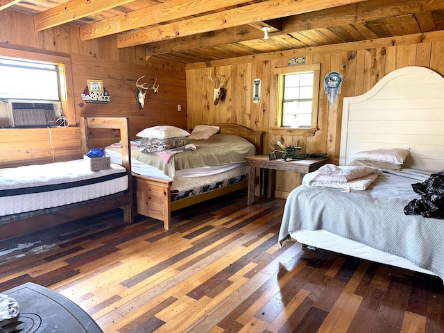 bedroom with wood ceiling, wooden walls, hardwood / wood-style floors, and beamed ceiling