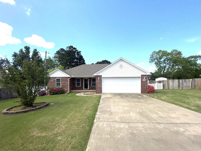 ranch-style home with fence, concrete driveway, an attached garage, brick siding, and a front yard