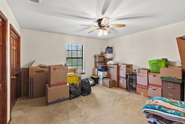 storage area featuring ceiling fan