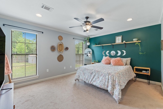 bedroom featuring baseboards, visible vents, carpet flooring, and multiple windows