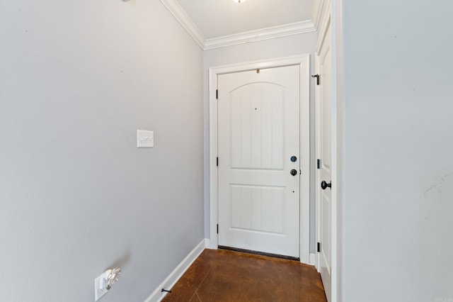 doorway to outside featuring baseboards, finished concrete flooring, and crown molding