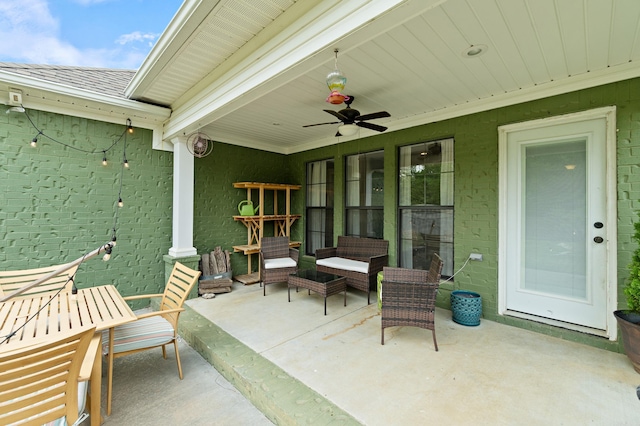 view of patio featuring a ceiling fan