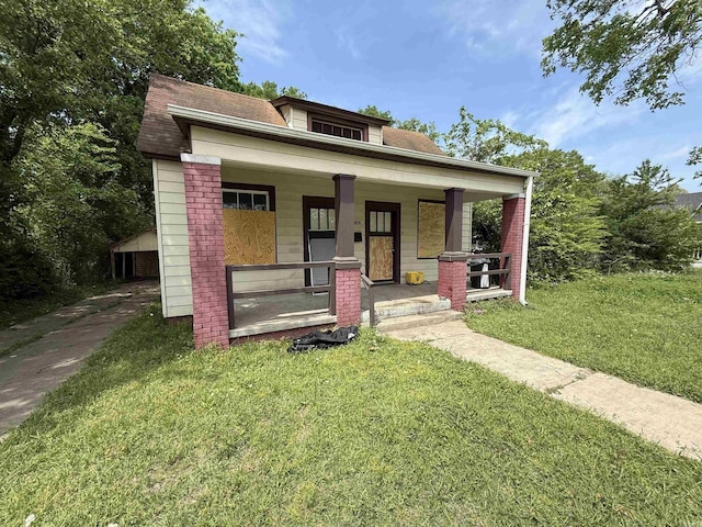 2808 Springer, Little Rock, AR 72206 - bungalow-style home with covered porch and a front lawn