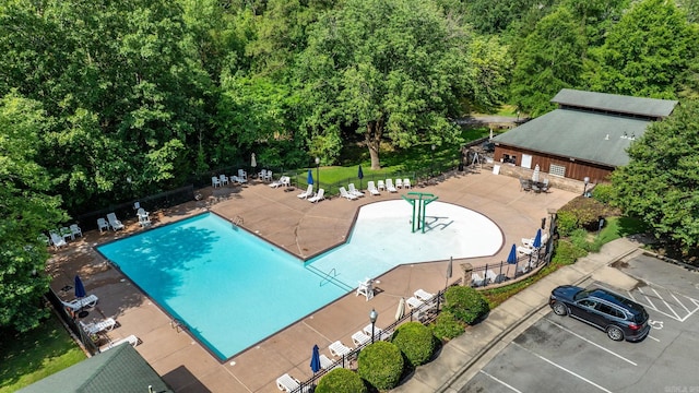 view of pool with fence