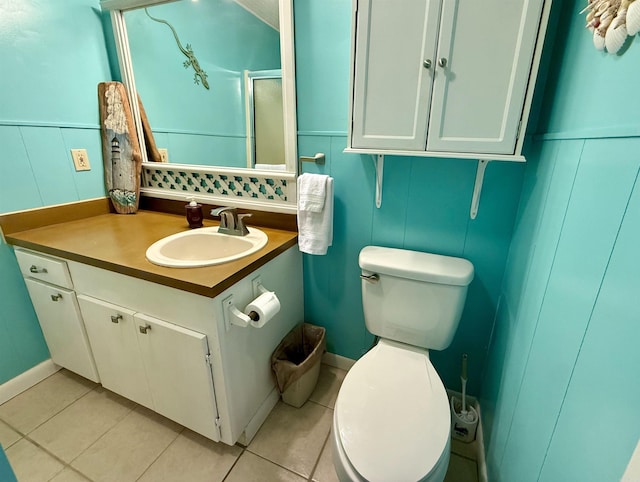 3986 Oak Grove Loop, Mountain View, AR 72560 - bathroom featuring vanity, tile patterned flooring, a shower stall, and toilet