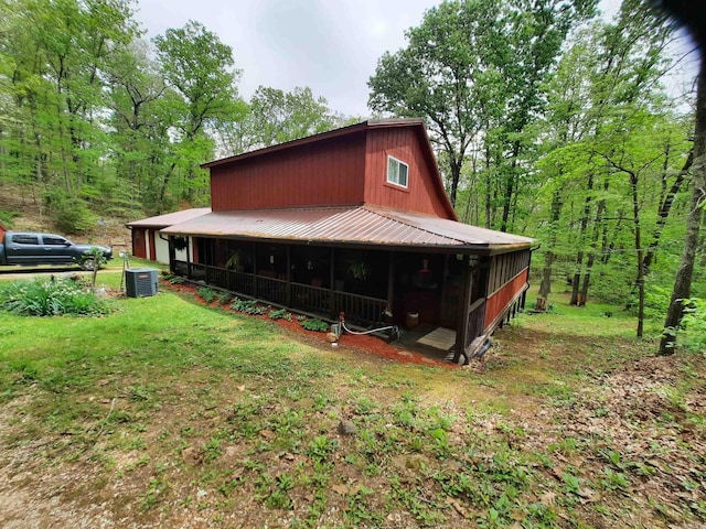 3986 Oak Grove Loop, Mountain View, AR 72560 - exterior space with a forest view, central AC, and metal roof