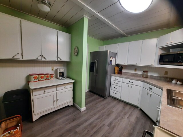 3986 Oak Grove Loop, Mountain View, AR 72560 - kitchen featuring white cabinets, light countertops, wooden ceiling, appliances with stainless steel finishes, and dark wood-style flooring