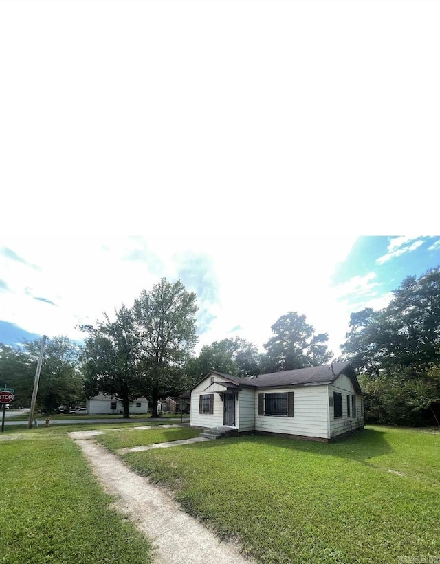 2004 S Maple St, Pine Bluff, AR 71603 - manufactured / mobile home featuring a front lawn and driveway