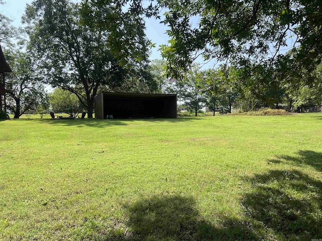 3223 Canal Dr, White Hall, AR 71602 - view of yard featuring an outdoor structure and a pole building