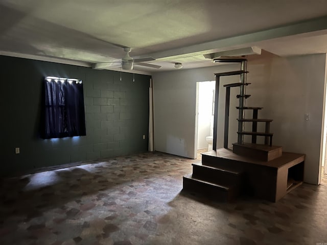 3223 Canal Dr, White Hall, AR 71602 - unfurnished living room featuring ceiling fan and concrete block wall