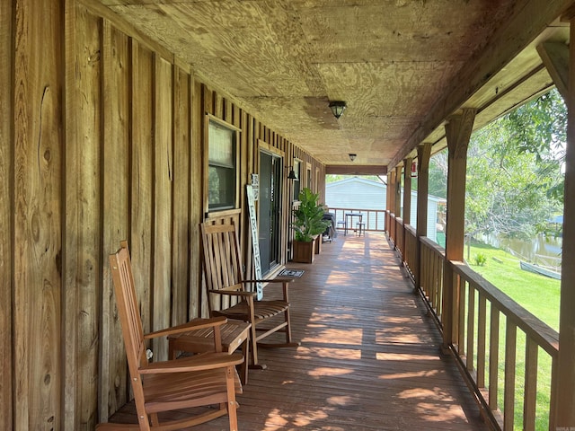3223 Canal Dr, White Hall, AR 71602 - deck with covered porch