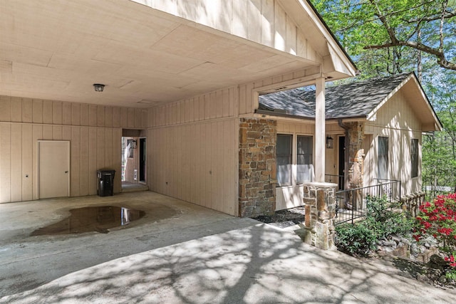 exterior space with a carport