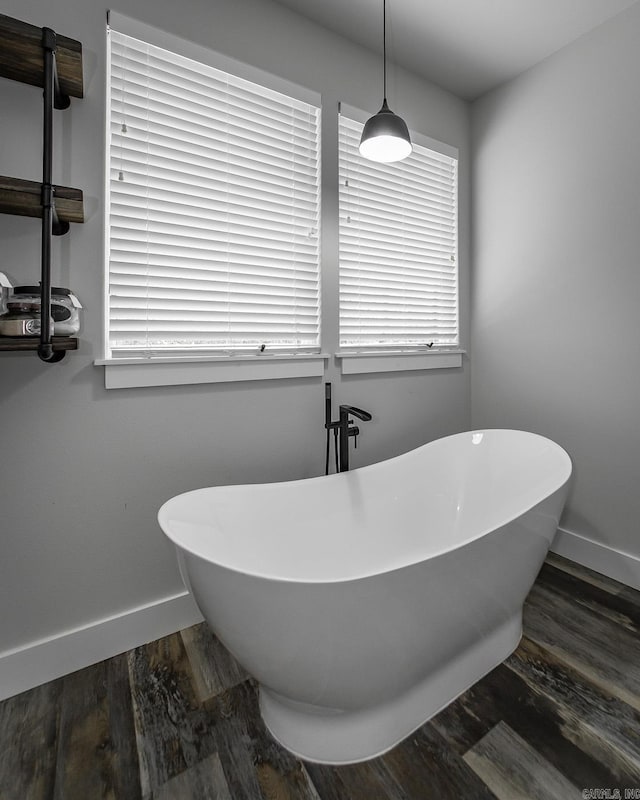 93 Pocahontas Ln, Greers Ferry, AR 72067 - full bathroom with a freestanding bath, wood finished floors, and baseboards