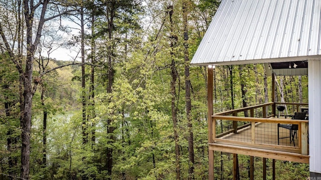 93 Pocahontas Ln, Greers Ferry, AR 72067 - exterior space featuring a wooden deck and a wooded view