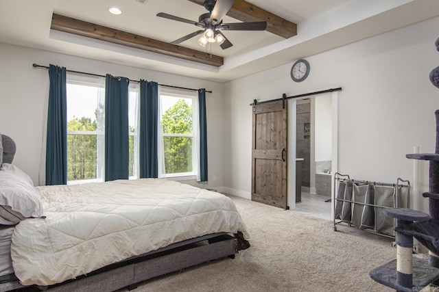 carpeted bedroom featuring a barn door, recessed lighting, connected bathroom, beam ceiling, and baseboards