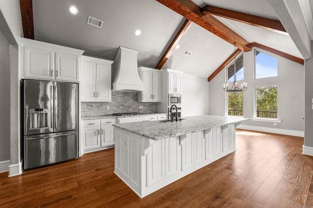 8908 Stillwater Rd, Sherwood, AR 72120 - kitchen with stainless steel appliances, a sink, visible vents, decorative backsplash, and custom range hood