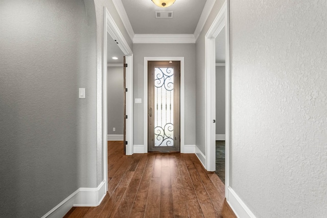 8908 Stillwater Rd, Sherwood, AR 72120 - entryway with baseboards, visible vents, crown molding, a textured wall, and dark wood-type flooring