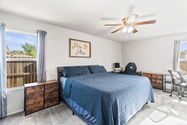 bedroom with carpet floors and a ceiling fan