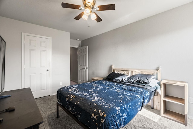 bedroom with carpet floors and a ceiling fan