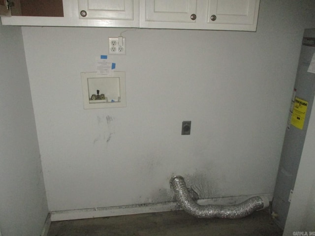 washroom with cabinet space, hookup for a washing machine, and hookup for an electric dryer