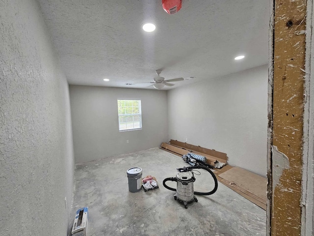 unfurnished room with recessed lighting, a textured ceiling, and ceiling fan