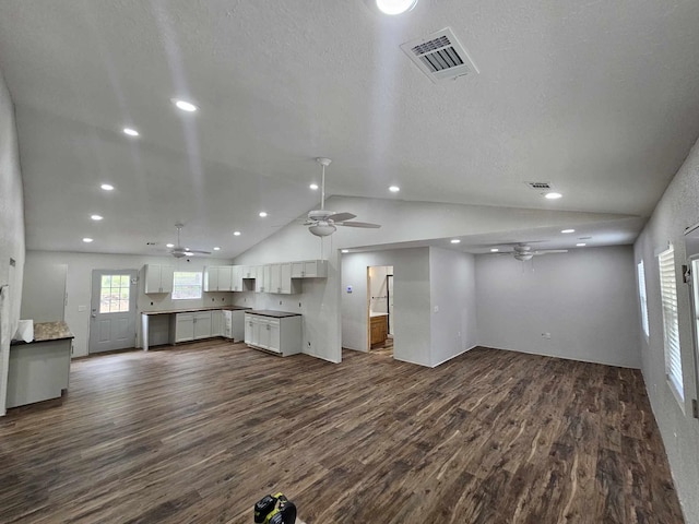 unfurnished living room featuring ceiling fan, dark wood-style floors, and recessed lighting