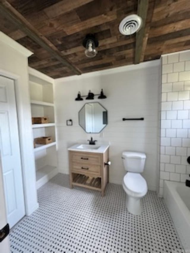 bathroom with visible vents, toilet, and vanity