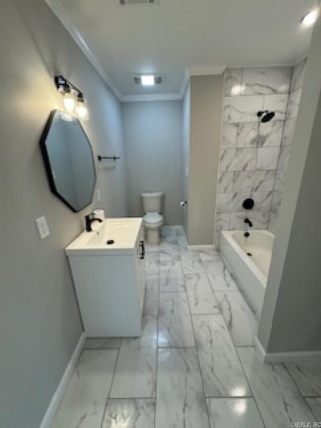 bathroom featuring marble finish floor, toilet, vanity, crown molding, and baseboards