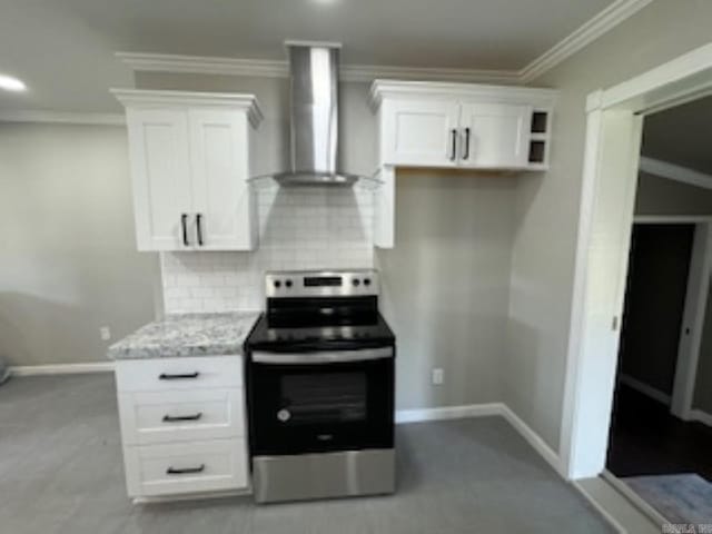 kitchen featuring white cabinets, stainless steel range with electric cooktop, ornamental molding, wall chimney exhaust hood, and tasteful backsplash