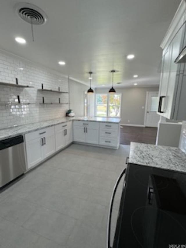 kitchen with light stone counters, open shelves, visible vents, stainless steel dishwasher, and decorative backsplash