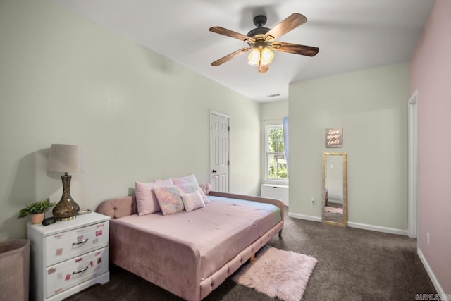 bedroom with baseboards, a ceiling fan, and dark carpet