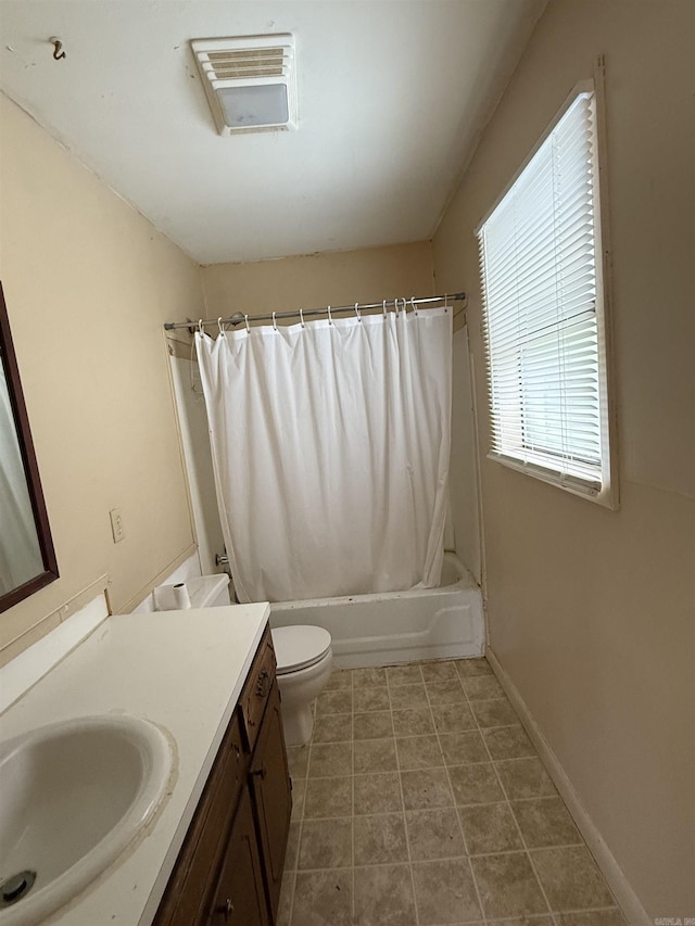bathroom featuring shower / bath combination with curtain, toilet, vanity, and visible vents