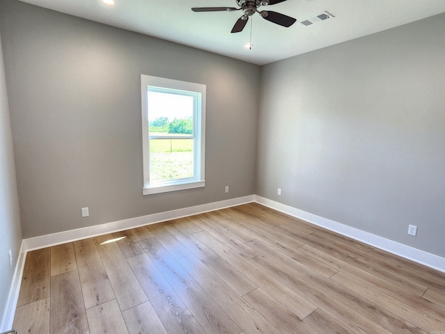 290 Walker St, Higginson, AR 72068 - spare room with ceiling fan, baseboards, wood finished floors, and visible vents