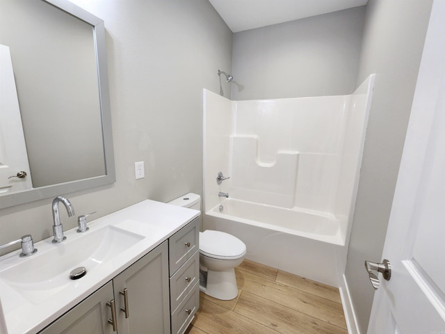 290 Walker St, Higginson, AR 72068 - bathroom with wood finished floors, toilet, vanity, and shower / tub combination